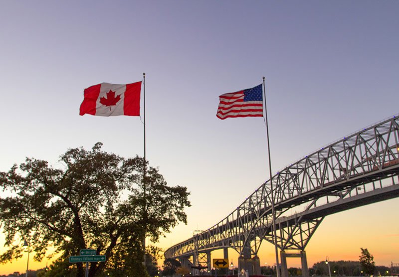 American Canadian border flags
