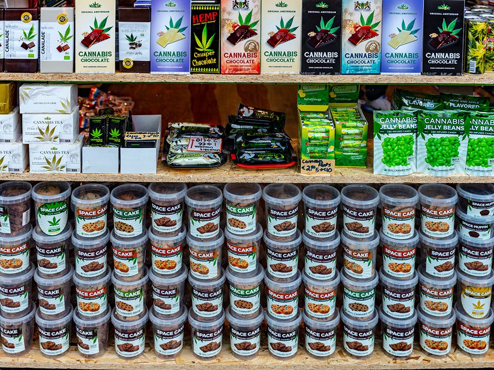 store shelf stocked with marijuana edibles