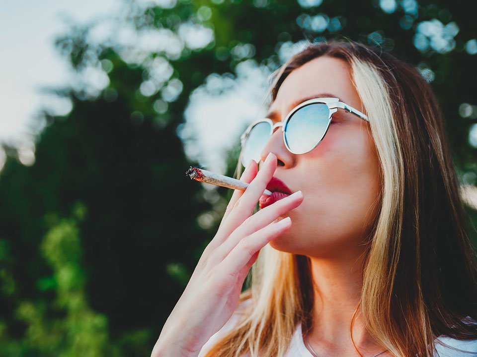 woman smoking a joint